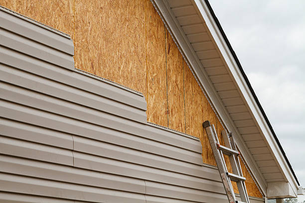 Professional Emergency Siding Repair technician working in Amelia, OH